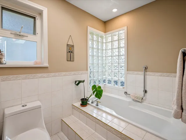 Full bath with a bath and toilet
