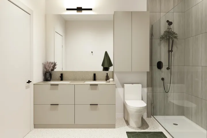 Contemporary bathroom featuring a double vanity with stone-finish countertop, dual integrated sinks, and matte black fixtures