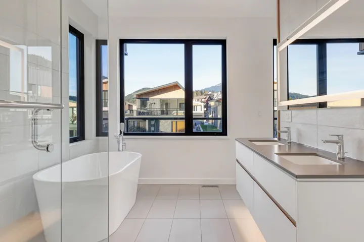 Bathroom with plenty of natural light, a sink, and tile patterned floors