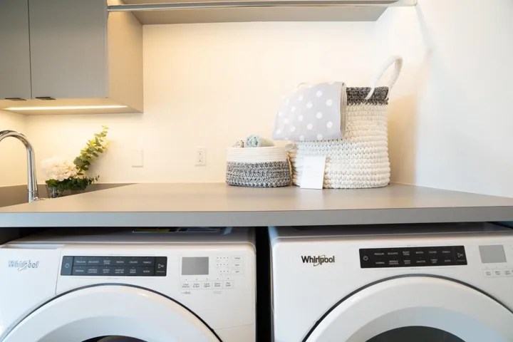 Laundry area featuring laundry area and washer and clothes dryer