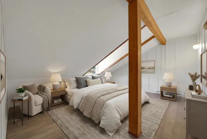 Bedroom featuring vaulted ceiling with beams, a skylight, hardwood / wood-style floors, a baseboard heating unit, and a decorative wall