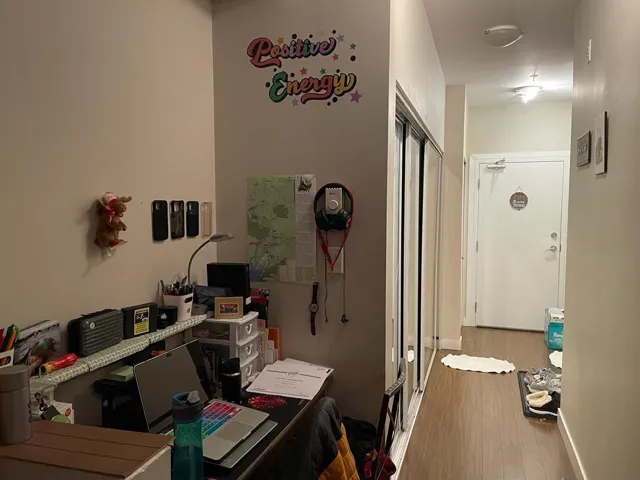 Office with wood finished floors