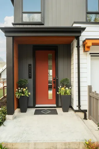 View of exterior entry featuring a porch