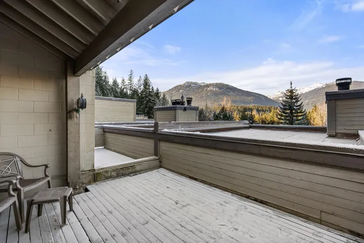 View of swimming pool featuring a hot tub and a patio
