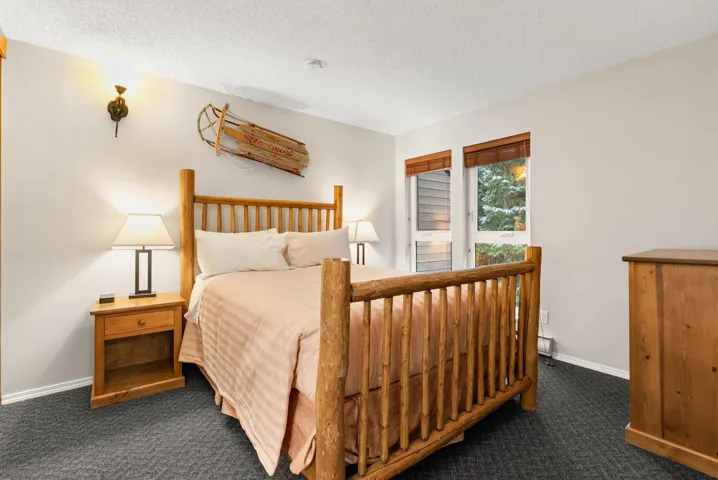 Aerial view of a pool area and a mountainous background