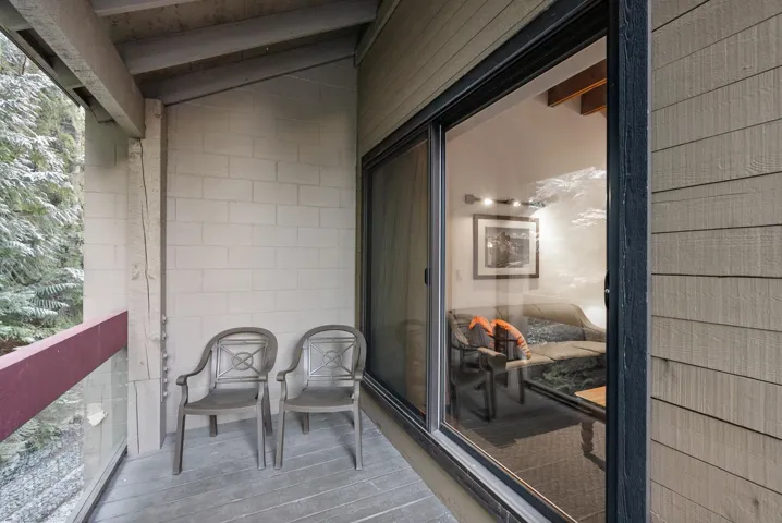 Bedroom featuring a textured ceiling and carpet floors