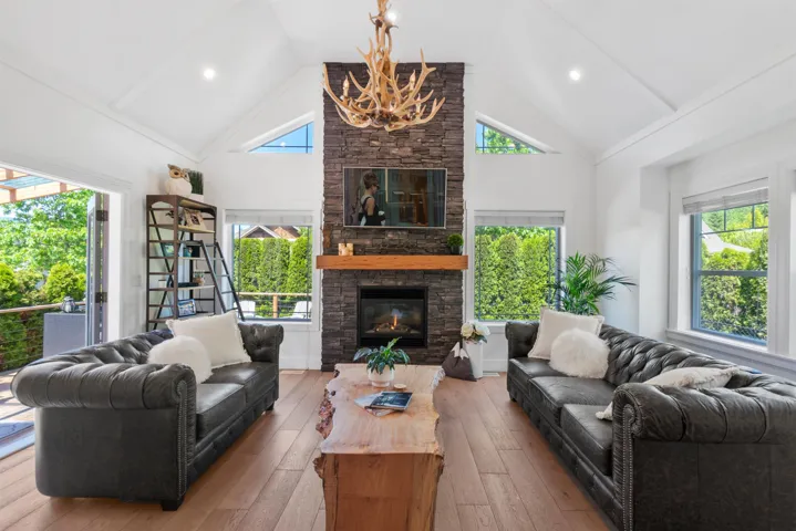 Open-concept living space with wood-finish flooring