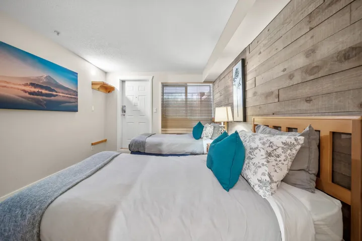 Bedroom with wooden walls