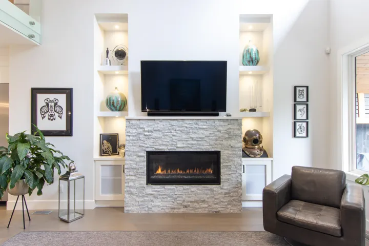 Laundry room with cabinet space, independent washer and dryer, and light tile patterned floors