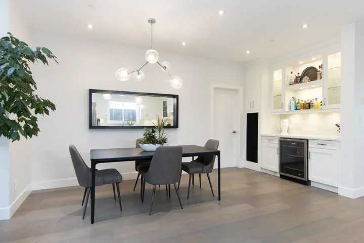 Corridor with recessed lighting and wood finished floors
