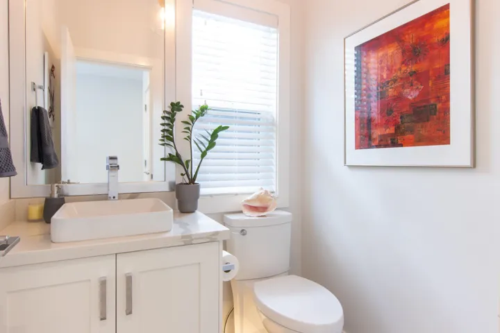 Indoor dry bar featuring white cabinetry, open shelves, backsplash, wine cooler, and light wood-type flooring