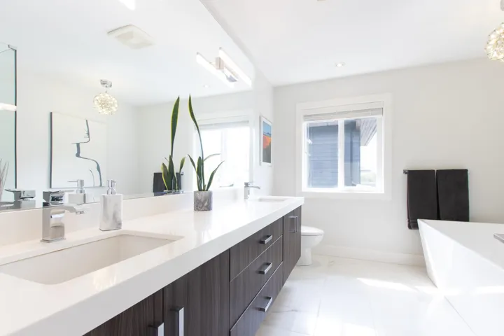 Bathroom with a freestanding bath and a sink