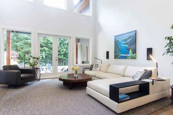 Staircase featuring wood finished floors and recessed lighting