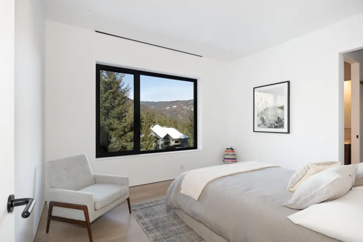 Bedroom with wood finished floors