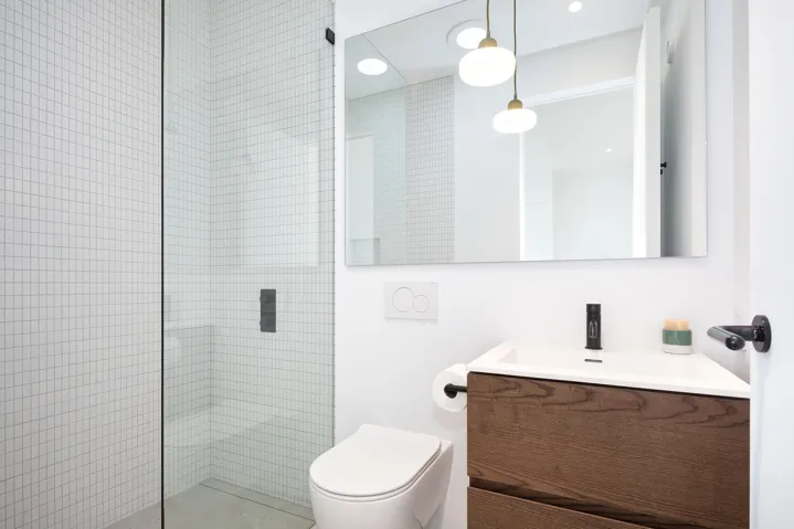 Full bath with vanity and a walk in shower
