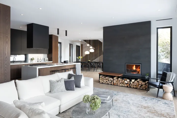 Living area featuring a fireplace, recessed lighting, and light wood finished floors