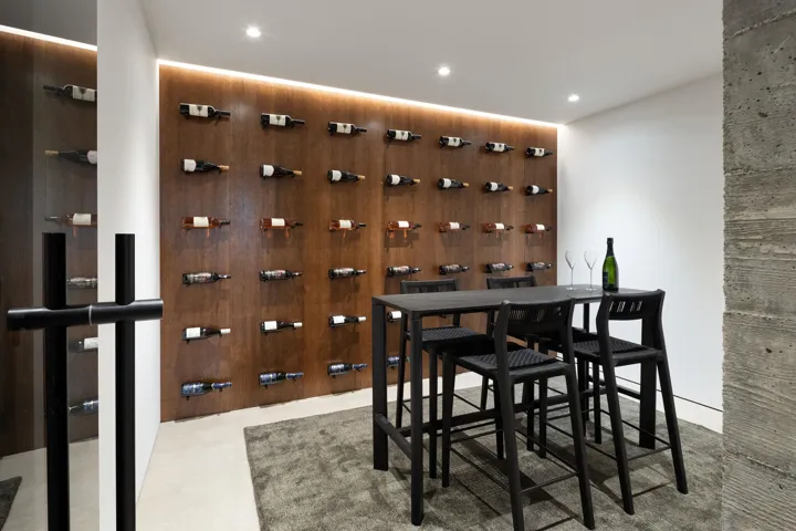 Wine room featuring recessed lighting