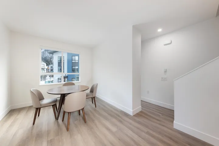 Dining room with baseboards, recessed lighting, and light wood-style floors