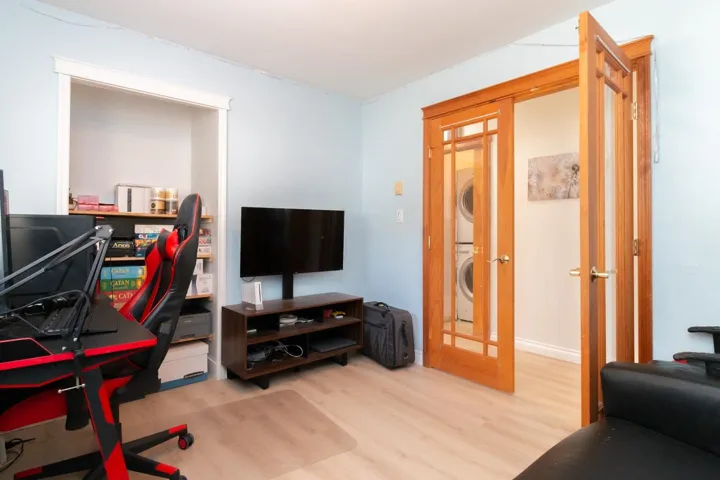 Office area featuring light wood-style floors