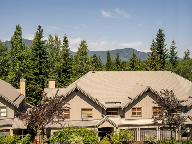 View of front of property featuring metal roof and a mountain view