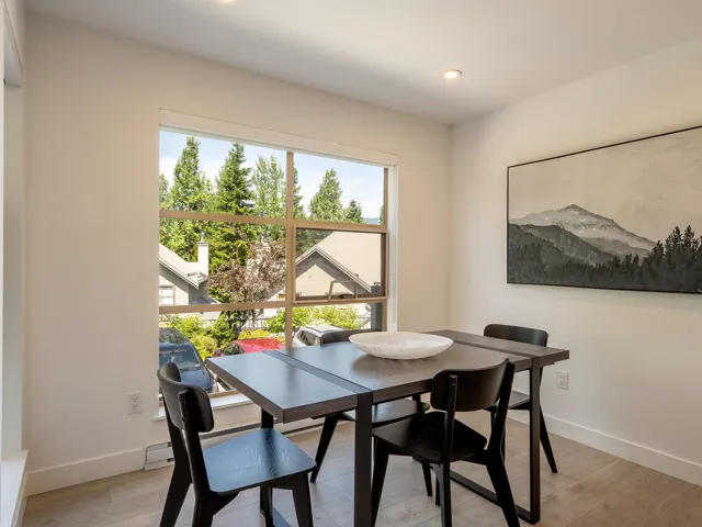 Dining space featuring light wood-style floors, baseboards, and recessed lighting