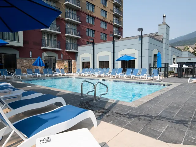 Community pool featuring a patio area
