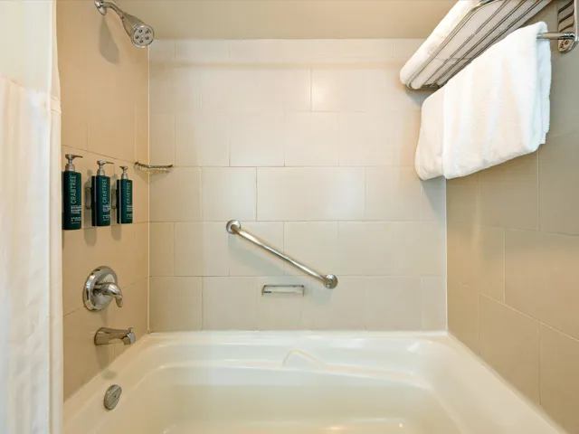 Full bathroom with shower / bath combo with shower curtain