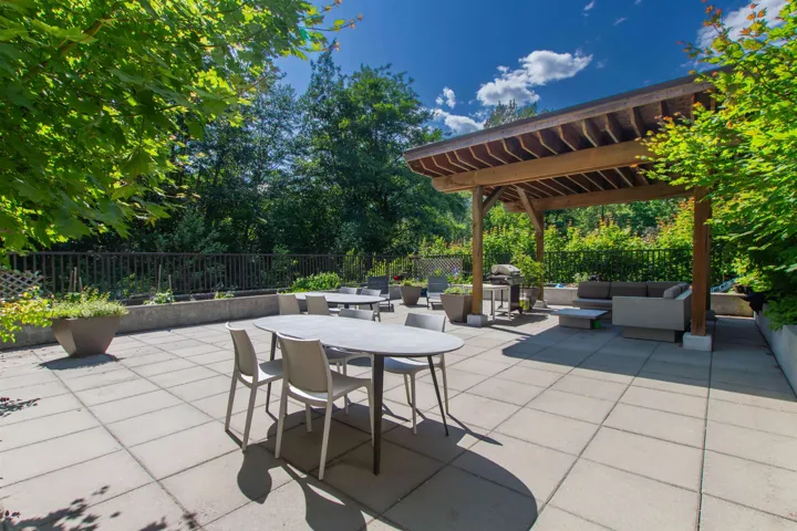 View of patio / terrace featuring outdoor dining space, a pergola, a fenced backyard, and an outdoor hangout area
