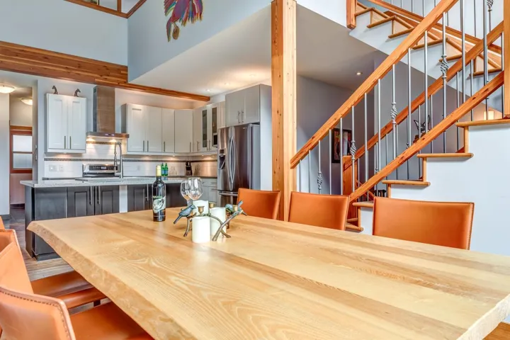 Dining space featuring stairway
