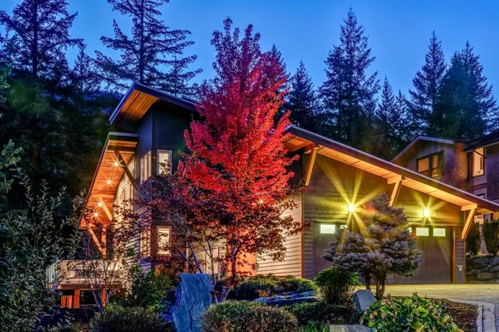 View of home's exterior with concrete driveway