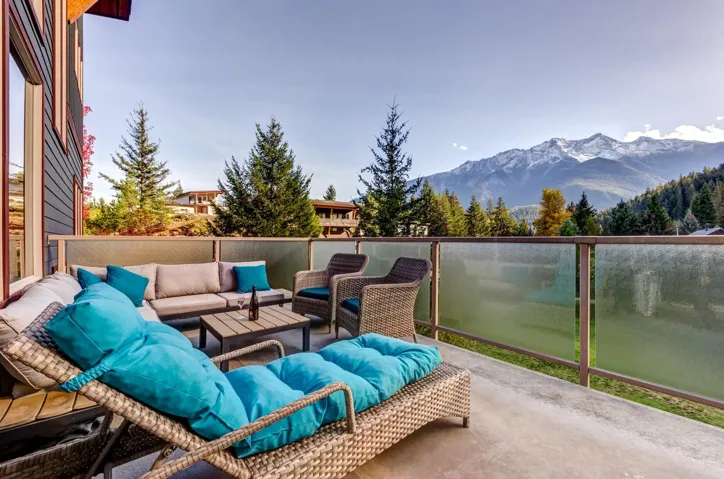 View of patio featuring an outdoor hangout area and a mountain view