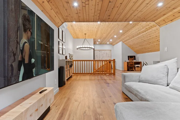 Living area featuring recessed lighting, vaulted ceiling, wood ceiling, and light wood-style floors