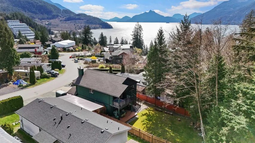 Aerial view of residential area with a water and mountain view