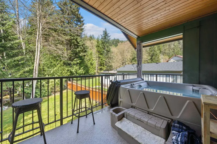 Balcony featuring a hot tub