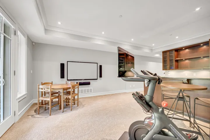 Wet bar and wine fridge in recreation room