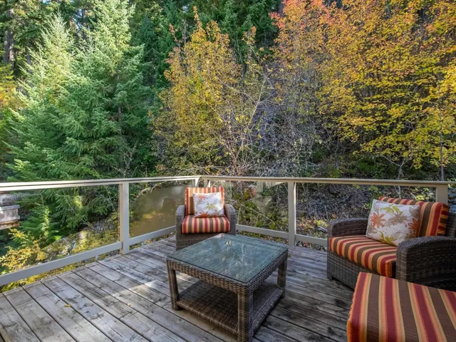 Deck featuring a view of trees