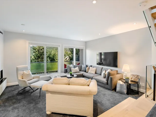 Living room with baseboards and recessed lighting
