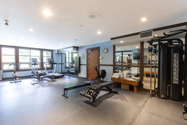Workout area featuring recessed lighting and baseboards