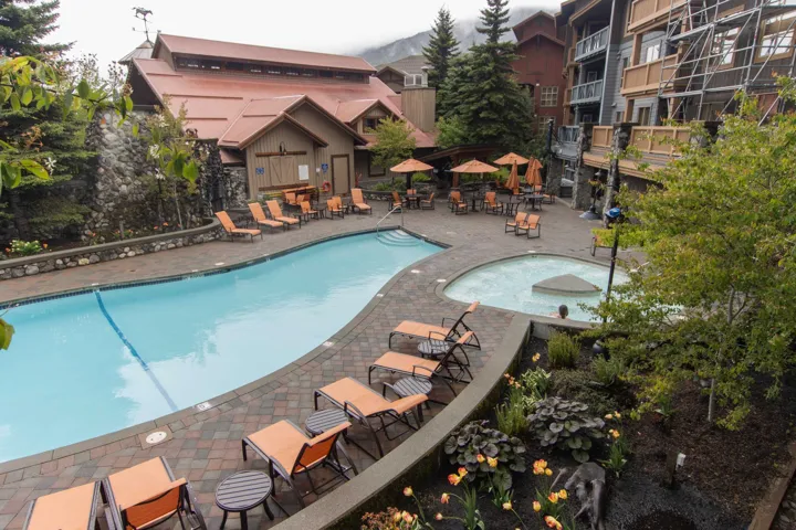 Community pool featuring a patio