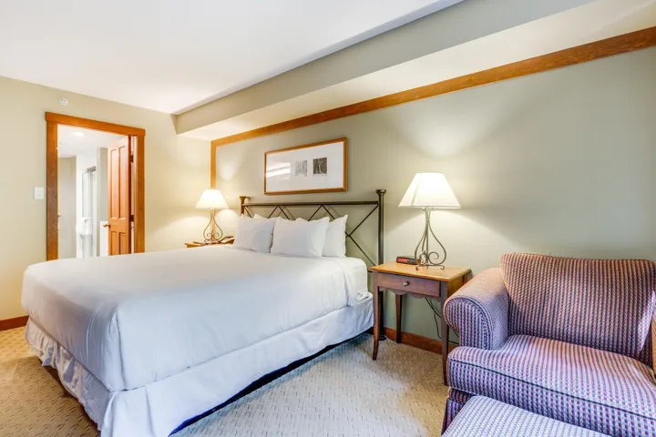 Bedroom with baseboards and carpet flooring