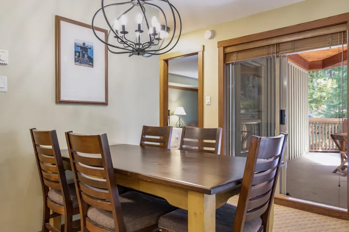 Dining area with a chandelier