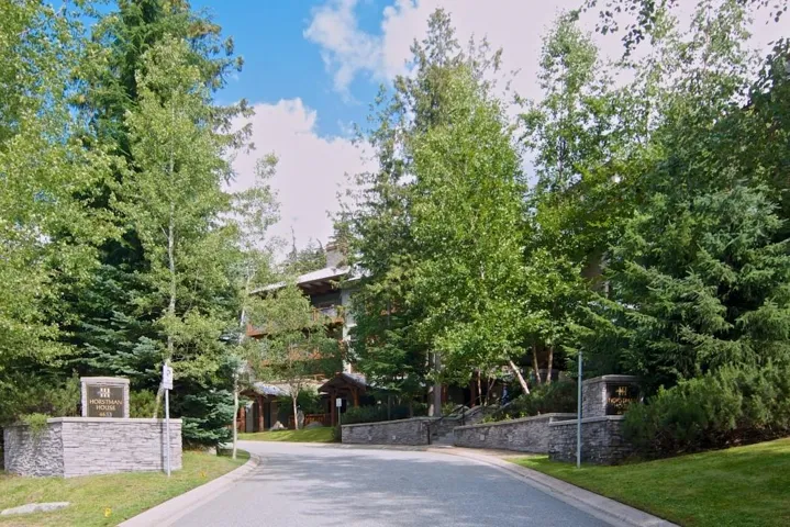 View of asphalt road with curbs
