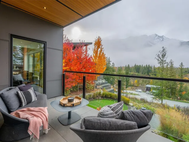 Balcony with an outdoor living space and a mountain view