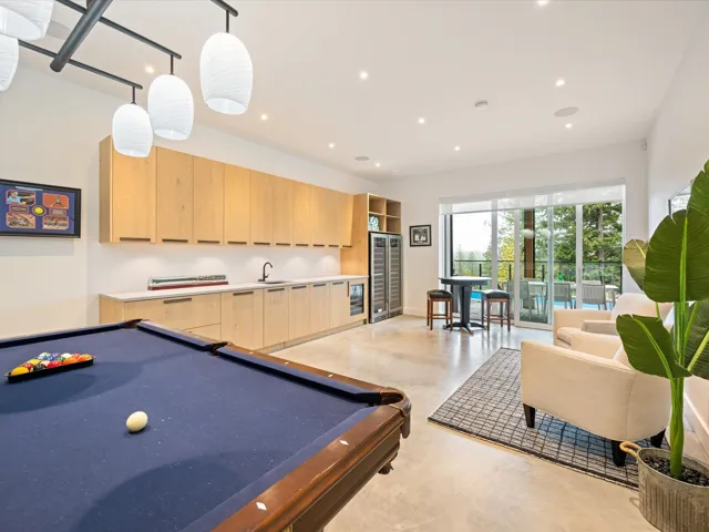 Game room featuring recessed lighting, finished concrete floors, wine cooler, and billiards table
