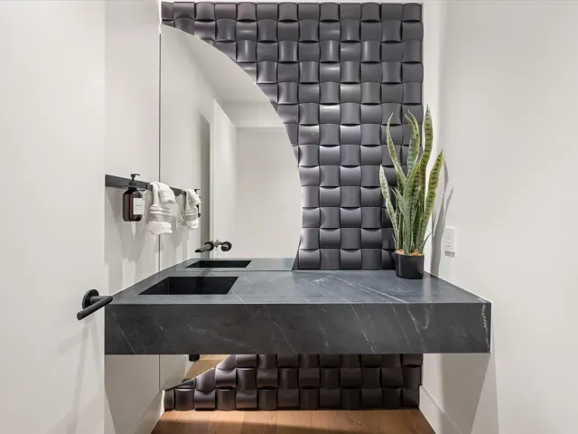 Detailed view of vanity and baseboards