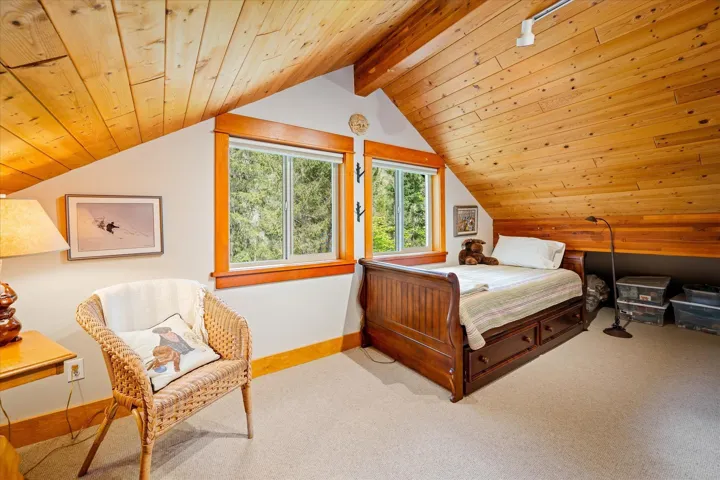 Vaulted wood-paneled ceilings with exposed beams