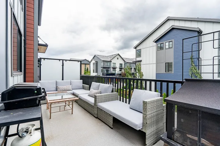 Balcony featuring an outdoor hangout area, a residential view, and grilling area