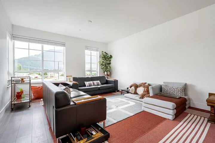 Living area featuring hardwood / wood-style floors and a mountain view