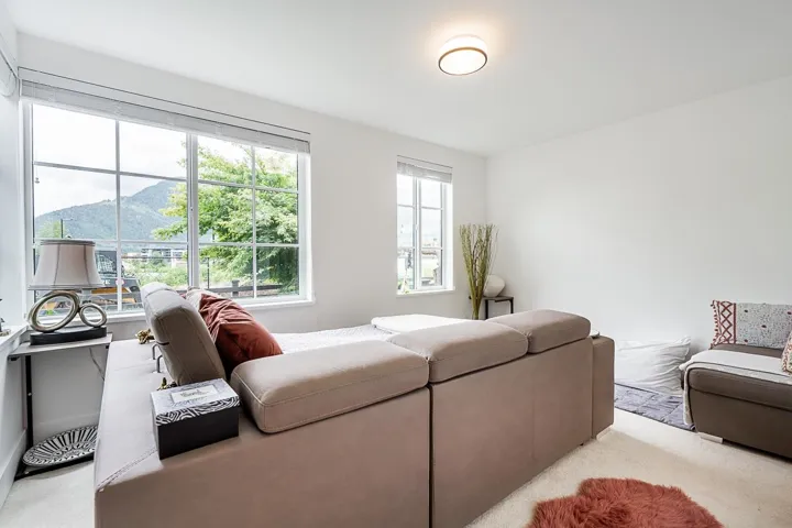 Carpeted bedroom featuring a mountain view