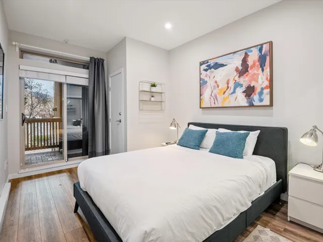 Bedroom featuring hardwood / wood-style floors and recessed lighting